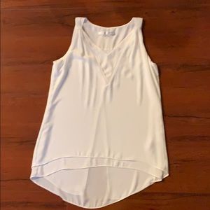 Peter Nygard white top